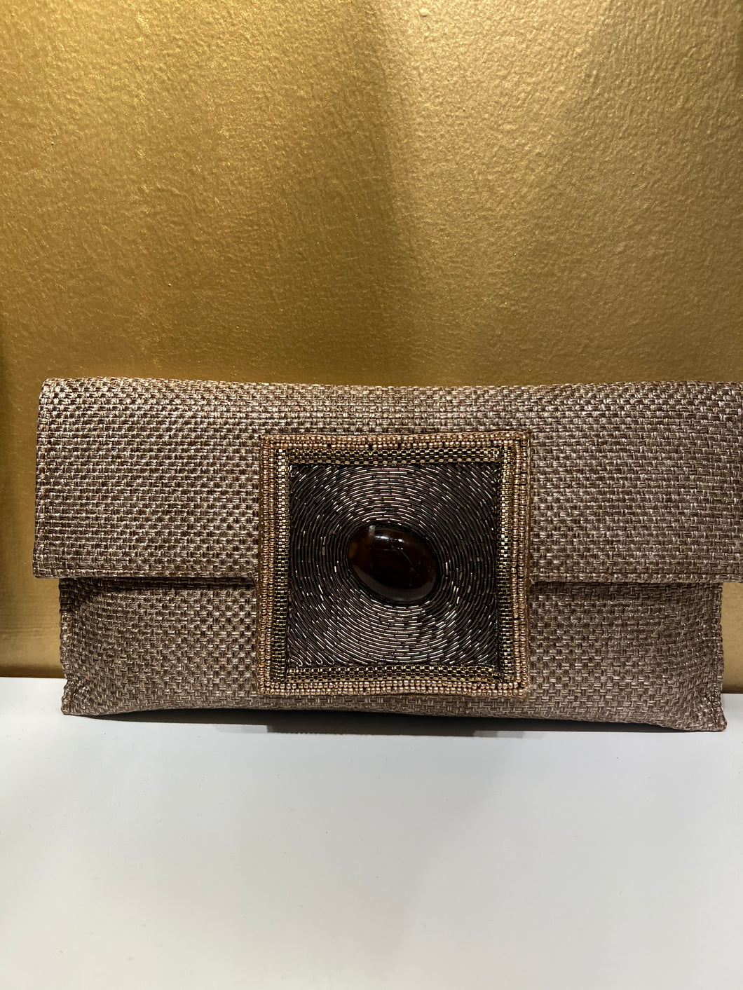 S square knot rafia clutch