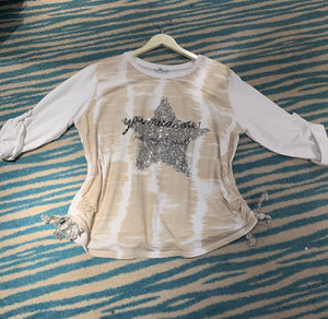 White and beige star top