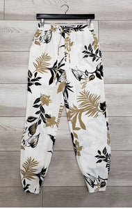 Jogger pants with leaves print
